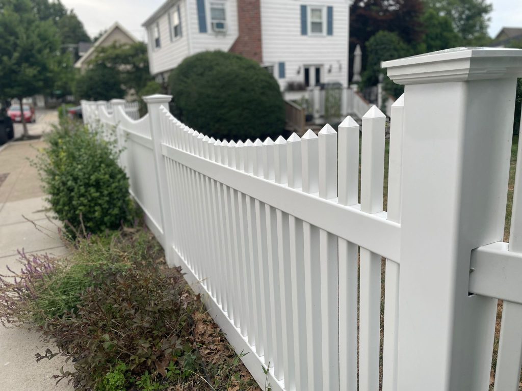 Modern fence made of vinyl, wood, chain link, aluminum